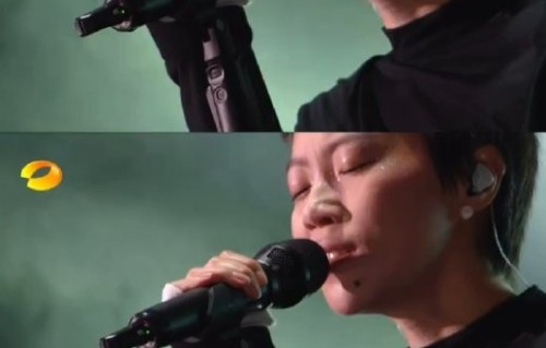 王菲窦靖童合唱的《童殿》的歌词是什么？